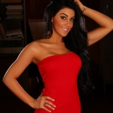 Beautiful Alluring Vixen tease Danielle shows off her perfect body in a tight red dress
