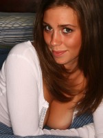Super good vixen leah relaxes in bed as her perky teenage tits almost fall out of her loose fitting top.